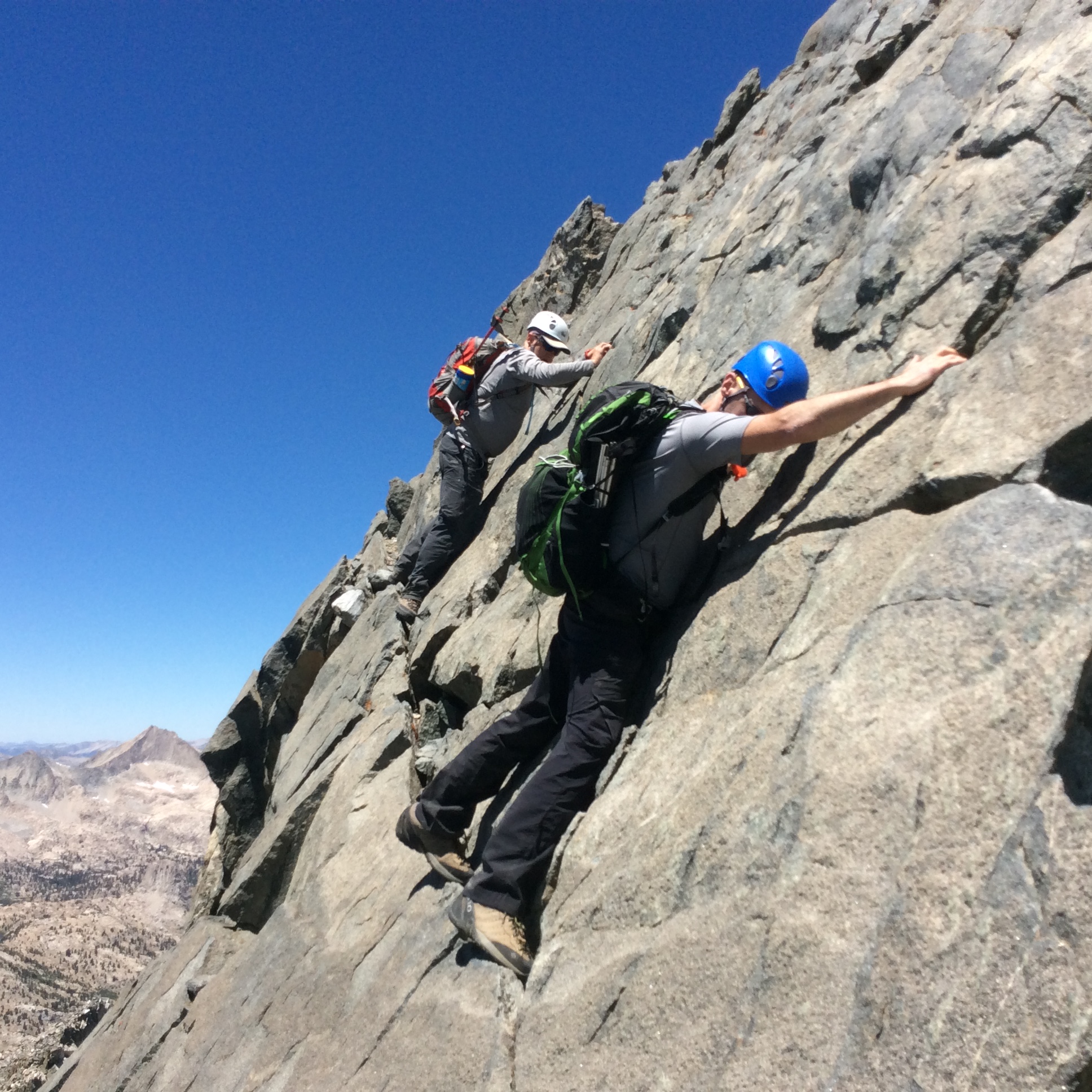 Craig and Cory negotiate the ledge below the summit